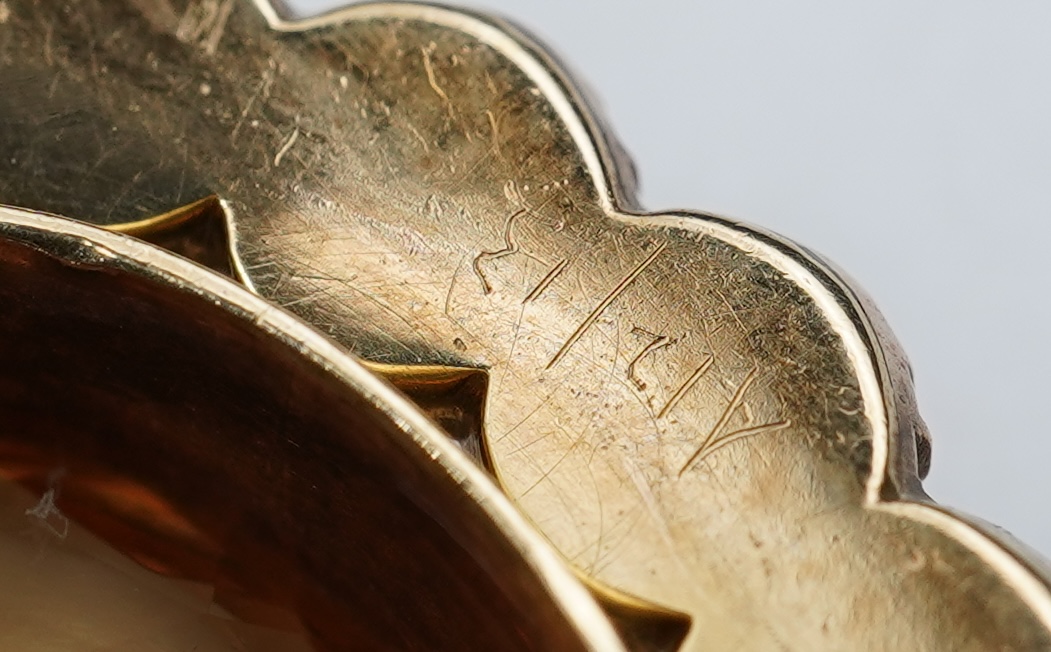 A Victorian topaz and pearl brooch, late 19th century